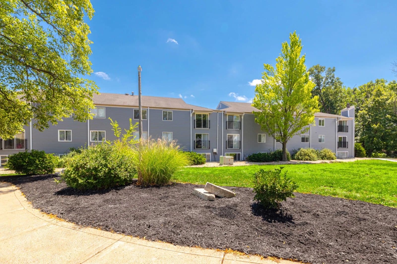 Apartment buildings and lawns at The Grove in north Peoria